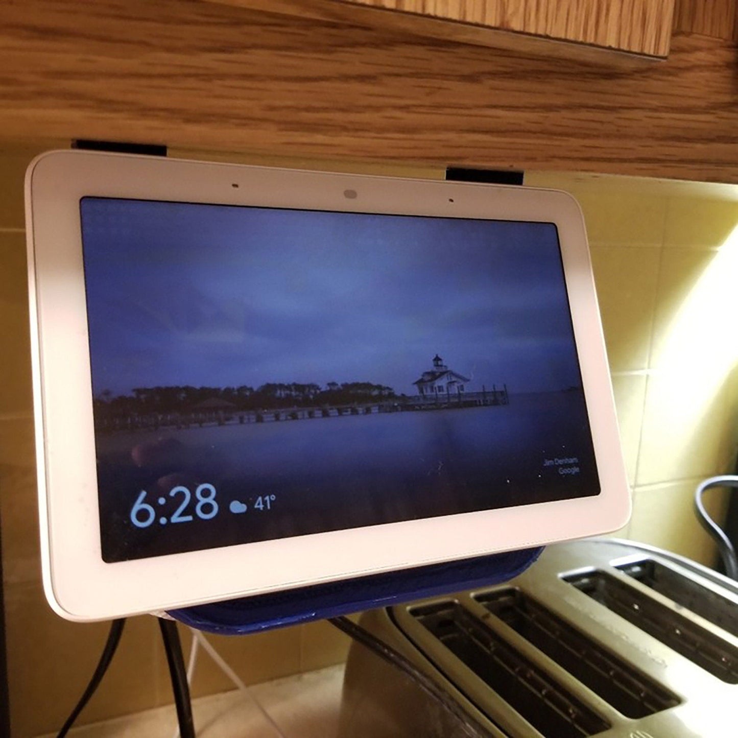 a tablet computer sitting on top of a stand