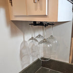 Under cabinet wine glass rack holding stemware upside down, view 5