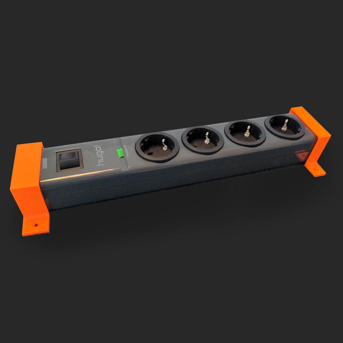 an orange and black power strip on a black background