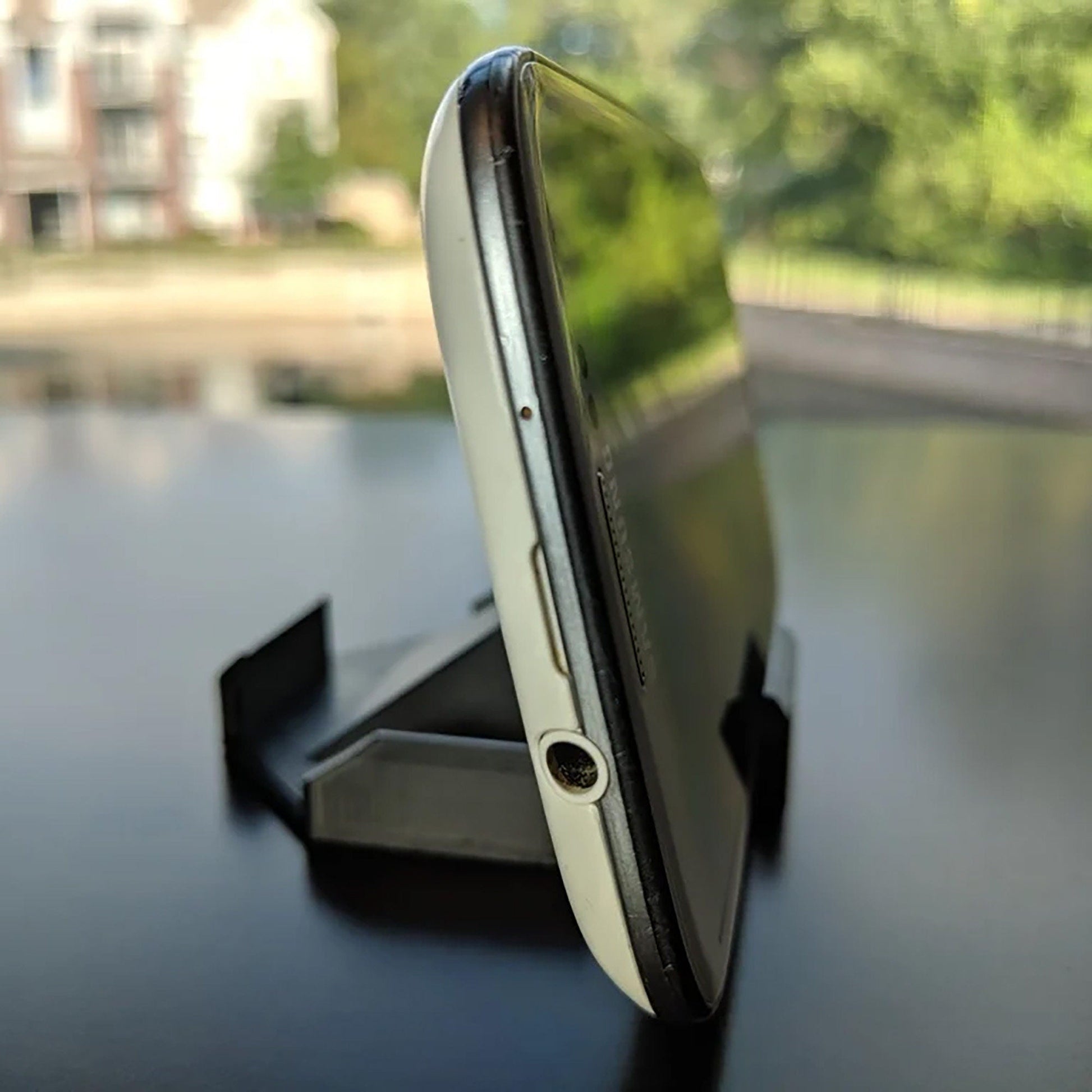 a close up of a cell phone on a table