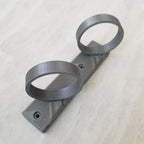 Wall mount holder with two adjustable ring cradles for stick vacuum attachments, view 2