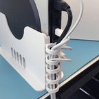 Multi-bay vertical rack holding several Apple Mac Mini units on edge, view 5
