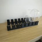 Vertical petri dish rack holding round and square dishes on edge
