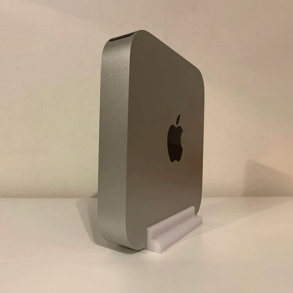 Low-profile vertical saddle stand holding an Apple Mac Mini on its side, view 2