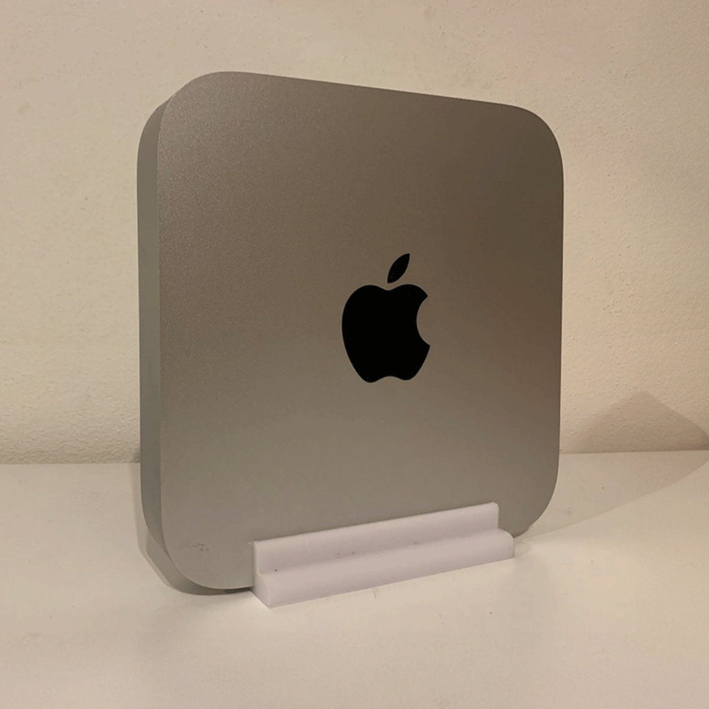 Low-profile vertical saddle stand holding an Apple Mac Mini on its side