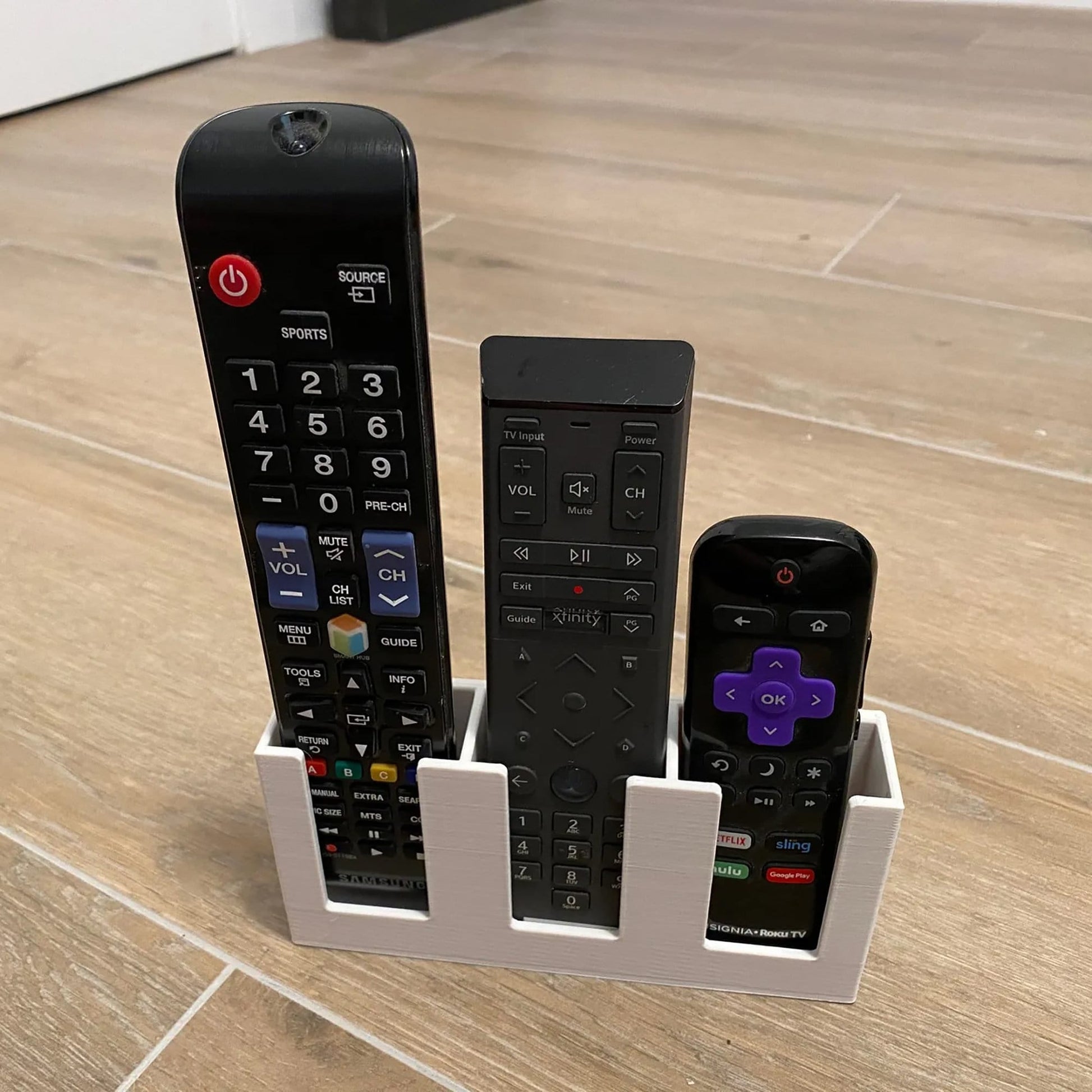 a couple of remotes that are on a table