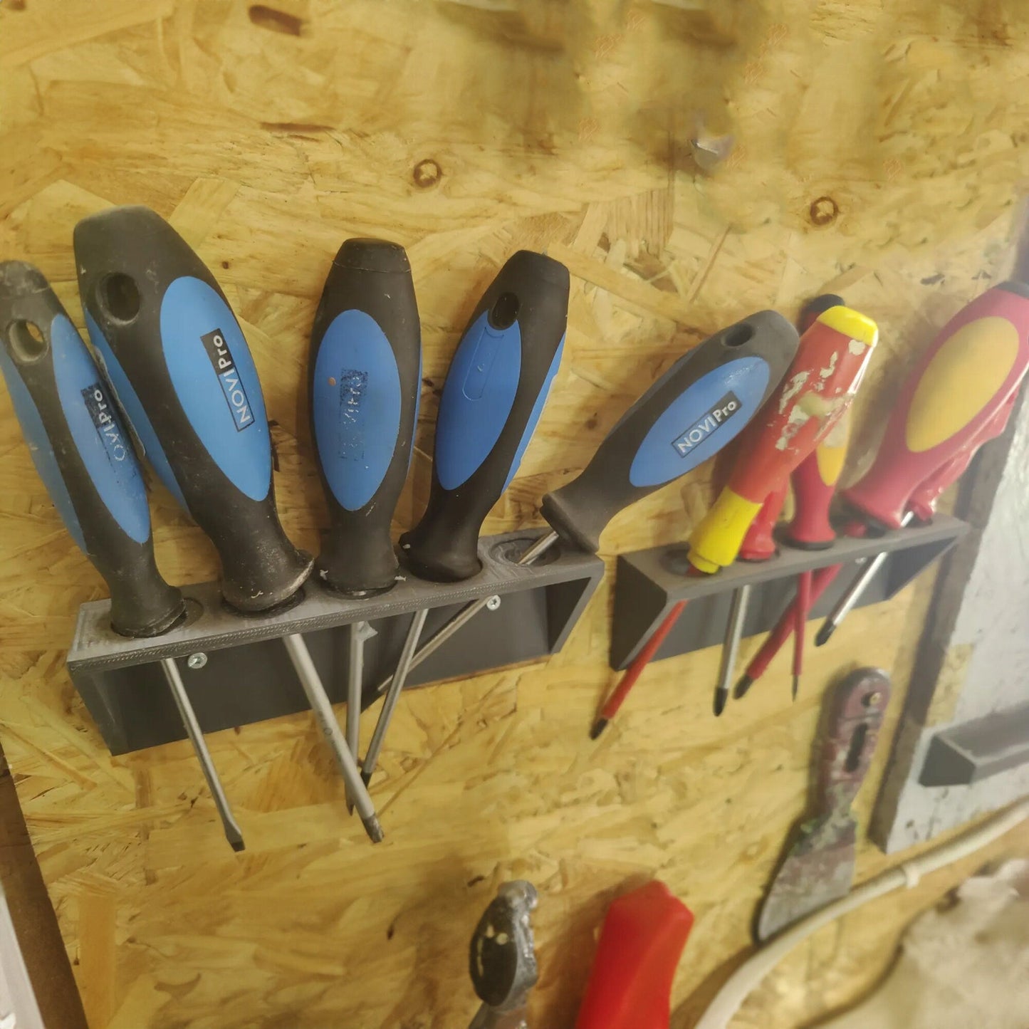 a bunch of tools that are on a shelf