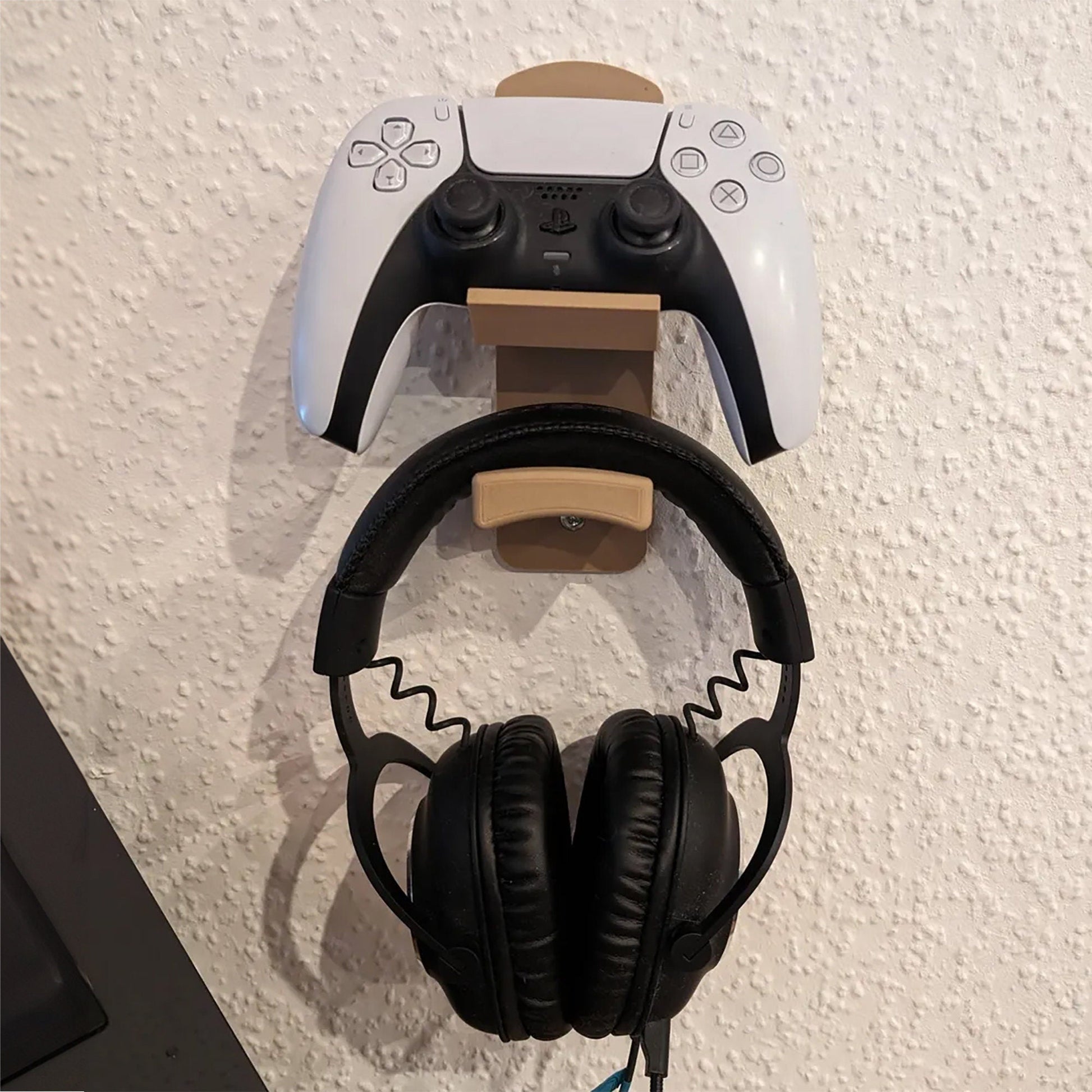 a pair of headphones hanging on a wall