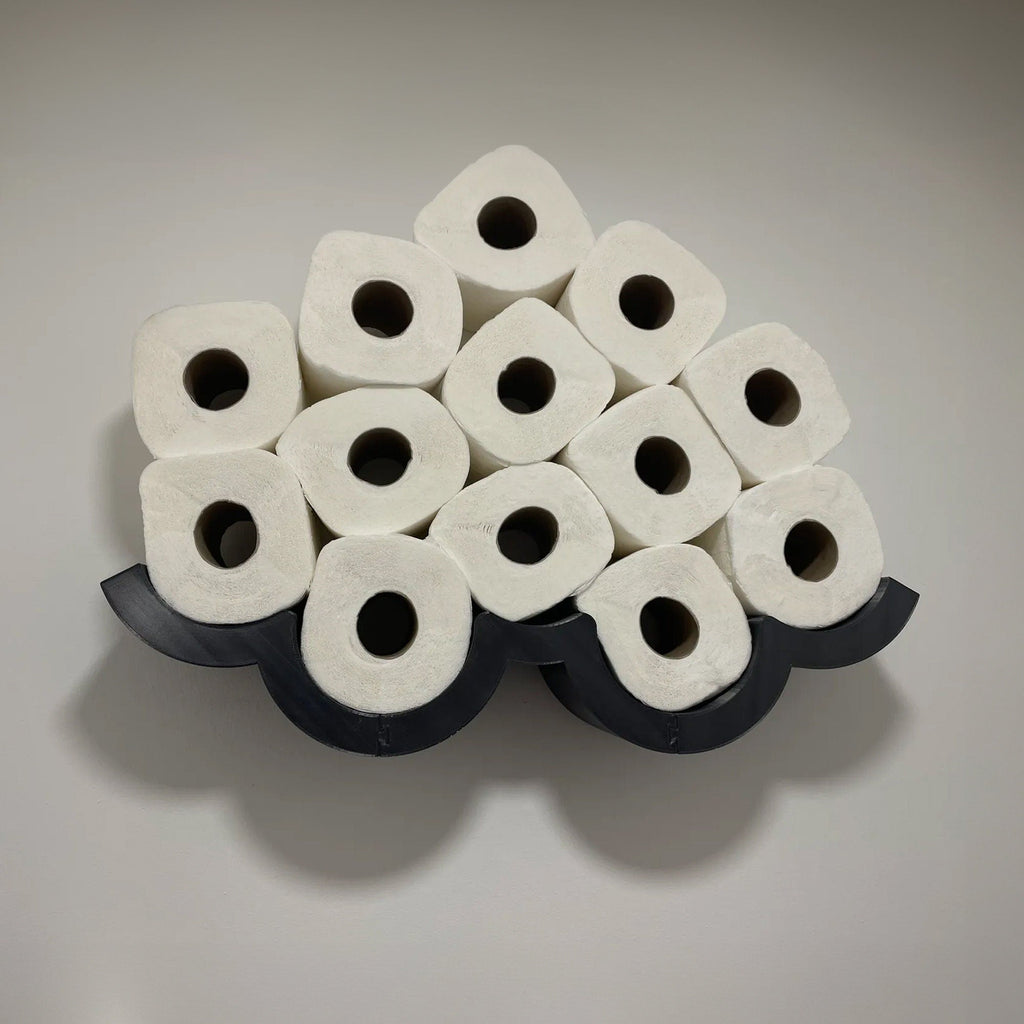 Cloud-shaped wall shelf holding spare toilet paper rolls upright in two rows, view 4