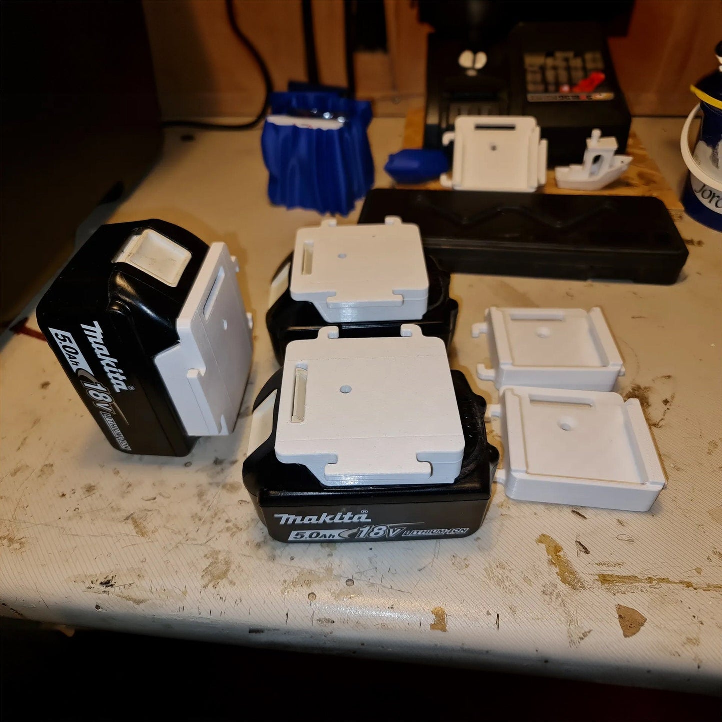 a table topped with different types of electronic devices