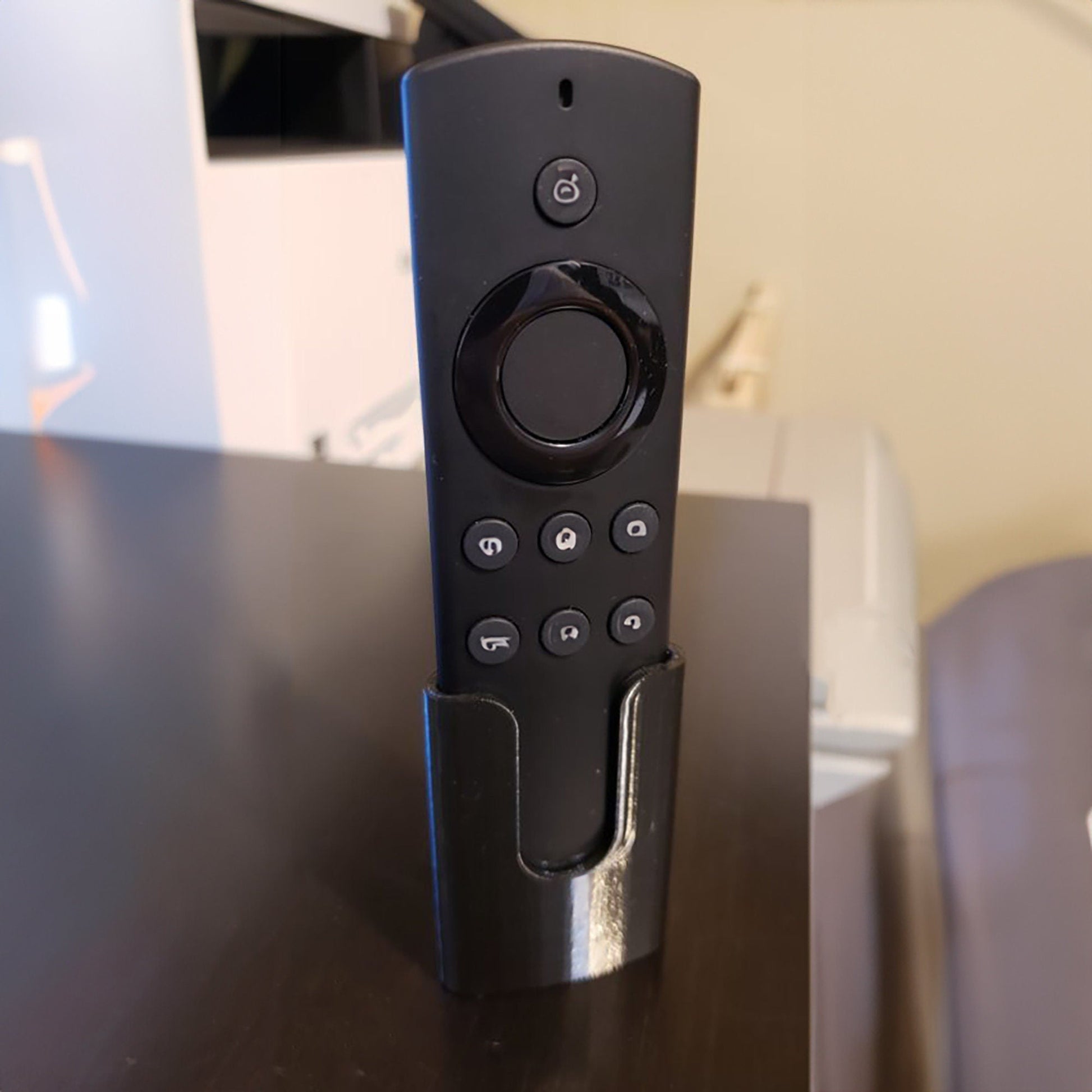 a close up of a remote control on a table