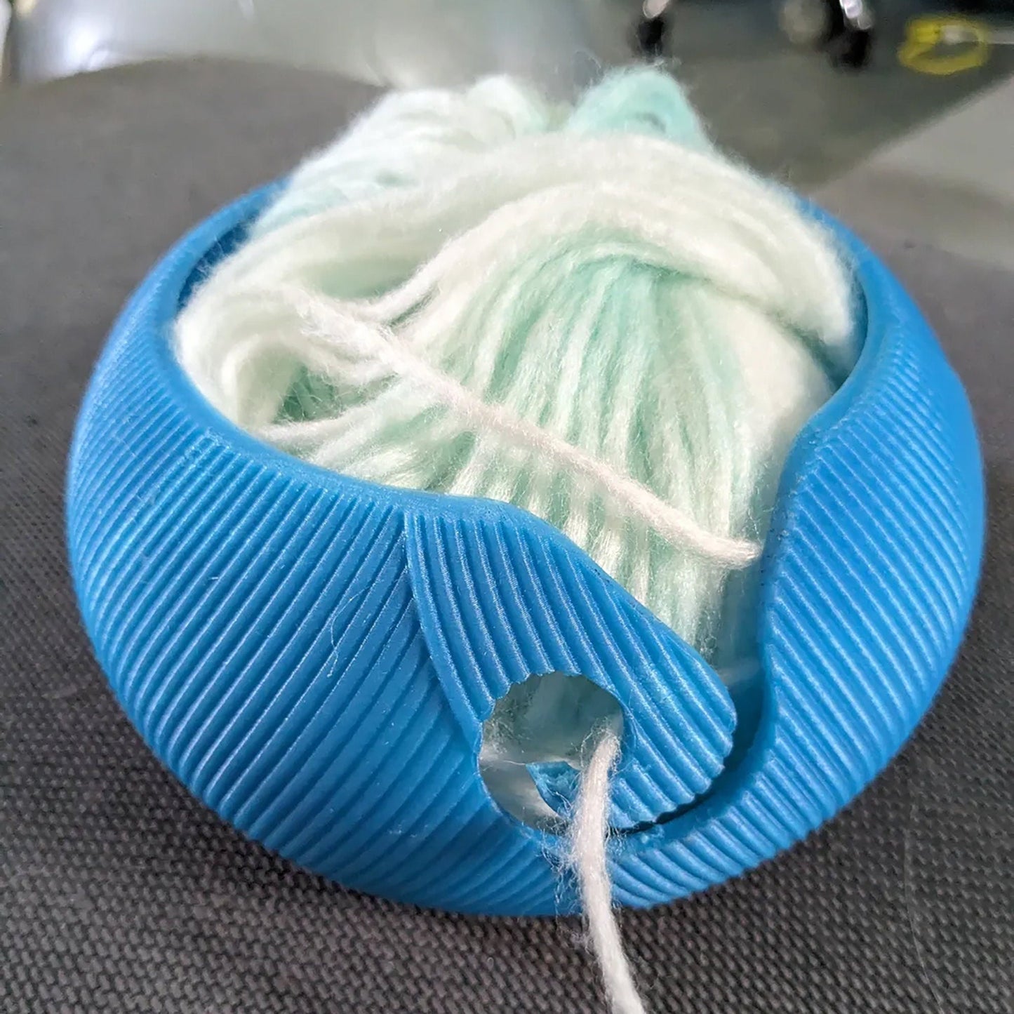 a ball of yarn sitting on top of a table